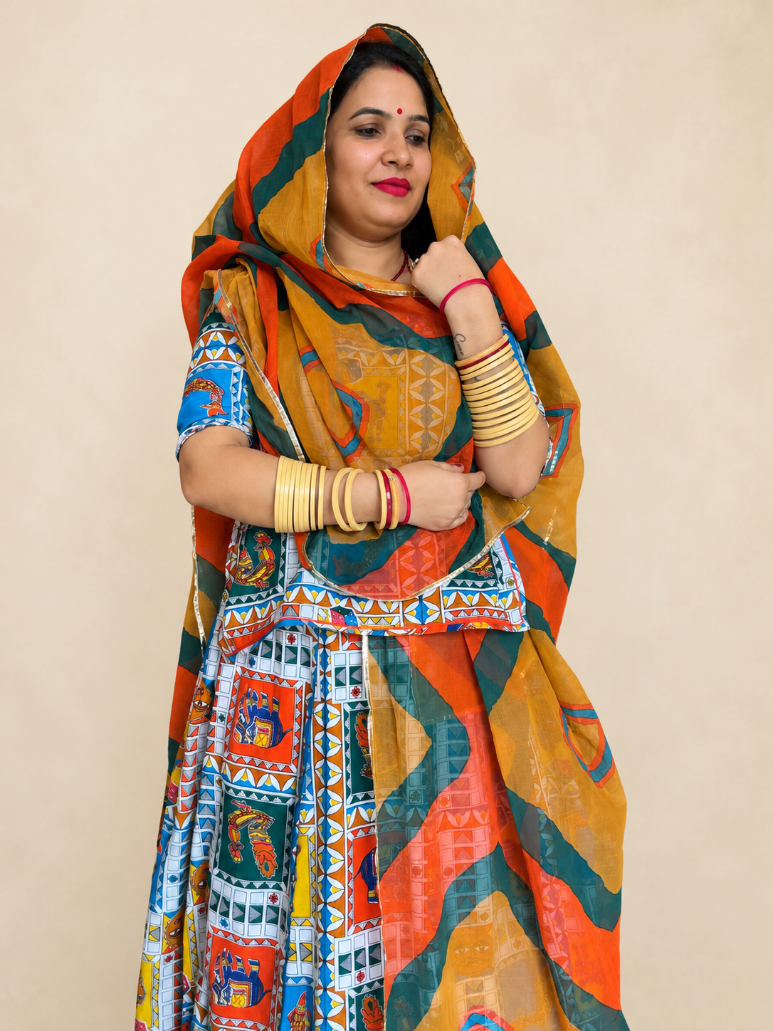 **Alt Text:** **Woman wearing cotton printed suit with cotton odhni – Panavi Paridhan**