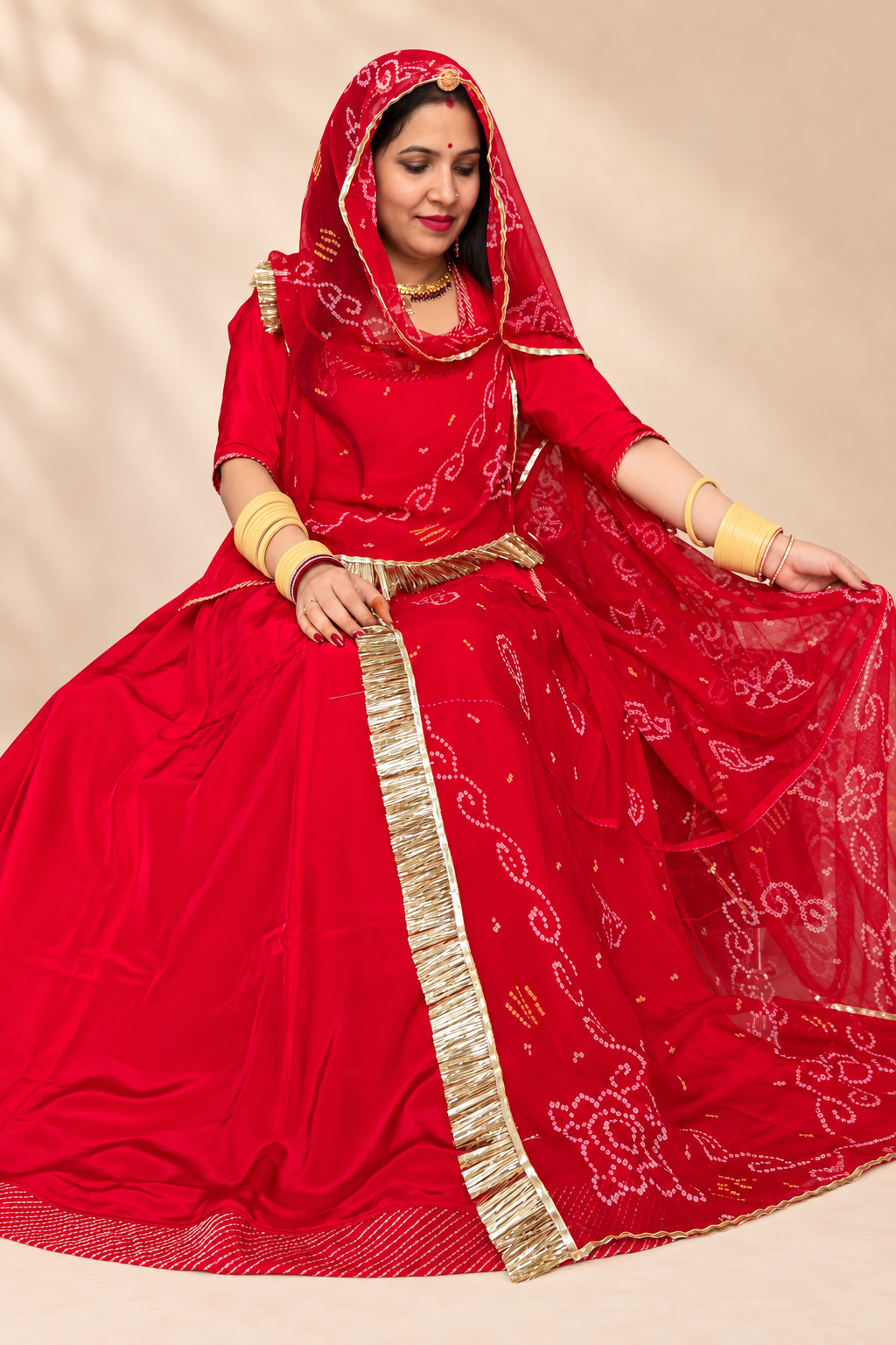**Alt Text:** Red Rajputi Traditional Dress with Bandhani Odhni and Golden Border – Panavi Paridhan