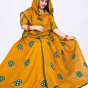 Beautiful mustard yellow Sentoon hand-dyed suit featuring traditional Ladu Bandhej design, green border detailing and matching cotton odhni by Panavi Paridhan.